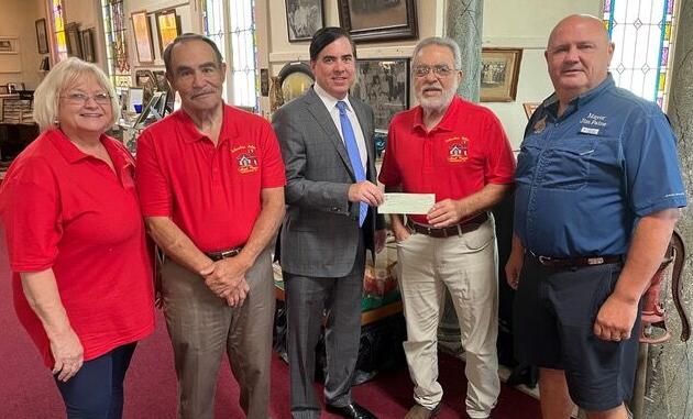 Rep. Nicholas Muscarello helps the Independence Italian Cultural Museum
